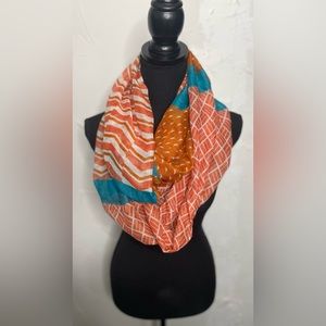 Lightweight gauzy Infinity scarf.